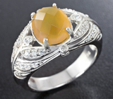 Серебряное кольцо с ограненным желтым опалом
