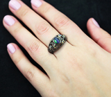 Серебряное кольцо с кристаллическим черным опалом и синими сапфирами