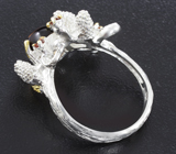 Серебряное кольцо с дымчатым кварцем и альмандинами гранатами