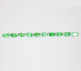 Кольцо с ограненным черным опалом 4,33 карата и цаворитами