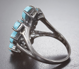 Серебряное кольцо с бирюзой и бесцветными топазами