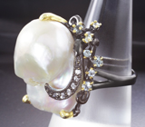 Серебряное кольцо с жемчужиной барокко и голубыми топазами Серебро 925