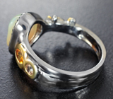 Серебряное кольцо с кристаллическим эфиопским опалом 1,65 карата и сапфирами