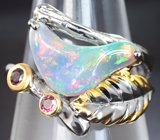 Серебряное кольцо с кристаллическим эфиопским опалом 2,12 карата и родолитами 