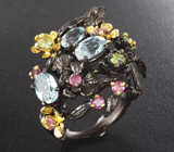 Серебряное кольцо с голубыми топазами, перидотами и розовыми турмалинами