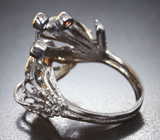 Серебряное кольцо с ограненным эфиопским опалом и родолитами Серебро 925