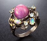 Серебряное кольцо с рубином, кристаллическими эфиопскими опалами и голубыми топазами