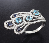 Ажурное серебряное кольцо с голубыми топазами и синими сапфирами