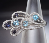 Ажурное серебряное кольцо с голубыми топазами и синими сапфирами Серебро 925