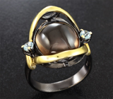Серебряное кольцо с дымчатым кварцем и голубыми топазами