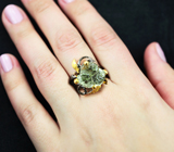 Серебряное кольцо с резным зеленым аметистом 10+ карат и оранжевыми турмалинами