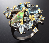 Серебряное кольцо с кристаллическим эфиопским опалом и голубыми топазами Серебро 925
