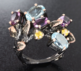 Серебряное кольцо с голубыми топазами, аметистами и желтыми сапфирами Серебро 925