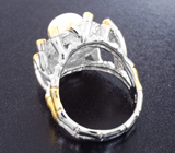 Серебряное кольцо с жемчужиной и рубинами