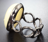 Серебряное кольцо с пастельно-желтым опалом и голубым топазом Серебро 925