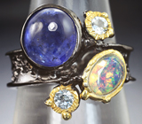 Серебряное кольцо с синим сапфиром, ограненным эфиопским опалом и голубыми топазами Серебро 925