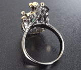Серебряное кольцо с зеленым бериллом и аметистами