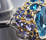 Серебряное кольцо с голубым топазом 18,02 карата, танзанитами и васильковыми сапфирами Серебро 925