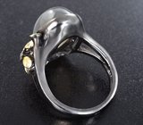 Серебряное кольцо с лунным камнем и голубыми топазами