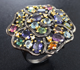 Серебряное кольцо с иолитами, аметистом, голубыми топазами и разноцветными турмалинами