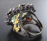 Серебряное кольцо с резным зеленым аметистом, аметистами и пиропами гранатами