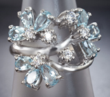 Романтичное серебряное кольцо с голубыми топазами
