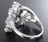 Романтичное серебряное кольцо с голубыми топазами