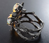 Серебряное кольцо с кристаллическими эфиопскими опалами и перидотом