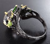 Серебряное кольцо с бесцветным кварцем, диопсидами и перидотами
