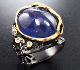 Серебряное кольцо с танзанитом 20+ карат и голубыми топазами