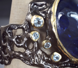Серебряное кольцо с танзанитом 20+ карат и голубыми топазами Серебро 925