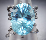 Серебряное кольцо с голубым топазом лазерной огранки 20,5 карата и васильковыми сапфирами Серебро 925