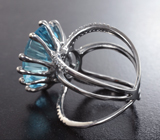 Серебряное кольцо с голубым топазом лазерной огранки 20,5 карата и васильковыми сапфирами Серебро 925