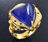 Массивный золотой перстень с уникальным пронзительно-синим танзанитом 23,33 карата, синими сапфирами и бриллиантами