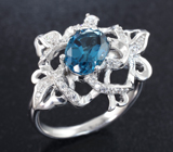 Ажурное серебряное кольцо с насыщенно-синим топазом Серебро 925