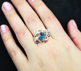 Ажурное серебряное кольцо с насыщенно-синим топазом