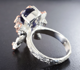Серебряное кольцо с синими сапфирами и голубыми топазами