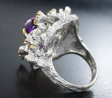 Серебряное кольцо с аметистом и бесцветными топазами