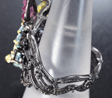 Серебряное кольцо с резным аквамарином, турмалинами и голубыми топазами