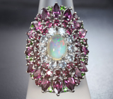 Шикарное серебряное кольцо с кристаллическим эфиопским опалом, родолитами гранатами, диопсидами и голубыми топазами Серебро 925