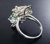 Серебряное кольцо с халцедоном, голубыми топазами, родолитом гранатом и диопсидами