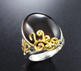 Серебряное кольцо с дымчатым кварцем и синими сапфирами