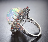 Серебряное кольцо с кристаллическим эфиопским опалом 12,54 карата и разноцветными сапфирами бриллиантовой огранки Серебро 925
