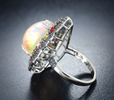 Серебряное кольцо с кристаллическим эфиопским опалом 9,78 карата, самоцветами и синими сапфирами бриллиантовой огранки Серебро 925