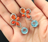 Впечатляющие серебряные серьги с голубыми топазами и оранжевыми опалами  Серебро 925