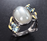 Серебряное кольцо с лунным канмнем и голубыми топазами
