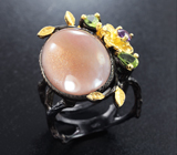 Серебряное кольцо с солнечным камнем, перидотами и аметистом