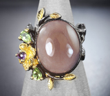 Серебряное кольцо с солнечным камнем, перидотами и аметистом