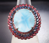 Серебряное кольцо с ларимаром 12,56 карата, красными и синими сапфирами бриллиантовой огранки