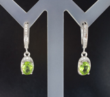 Симпатичные серебряные серьги с перидотами Серебро 925